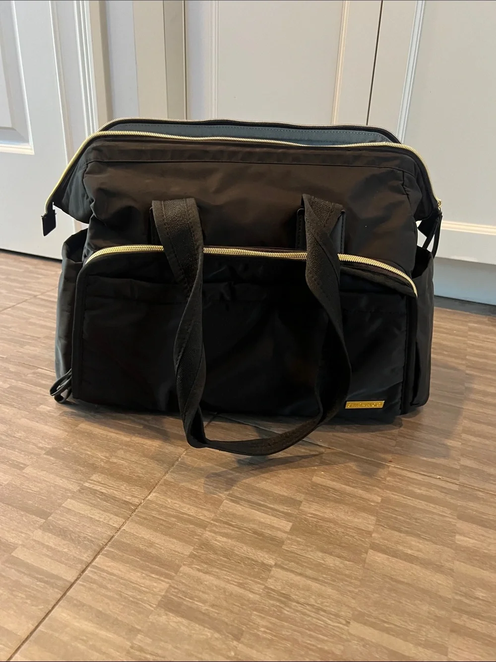 Skip Hop Black Baby Diaper Bag with Gold Zipper Accents